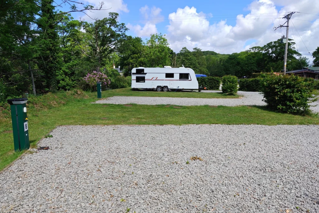 Fully-serviced hardstanding and grass touring pitch (super)