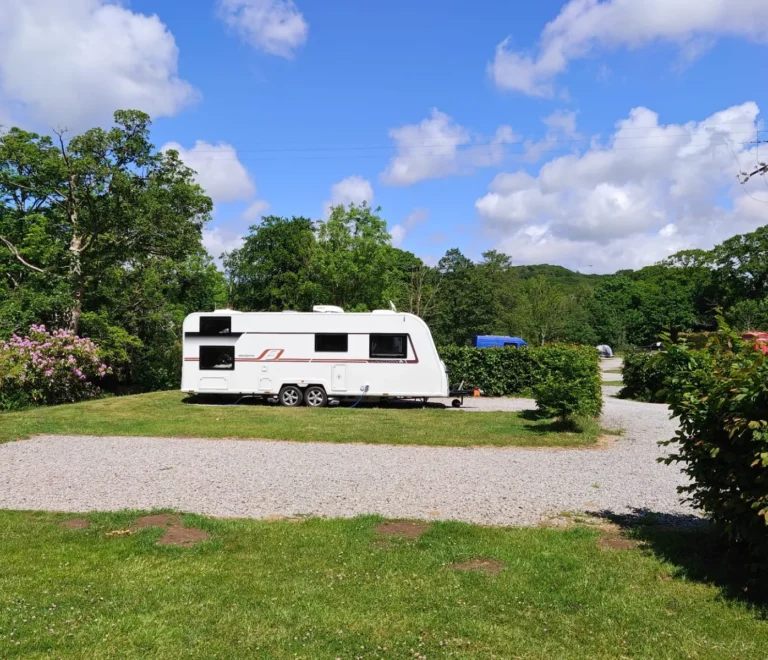 The Old Post Office Campsite in Lake District - Electric hardstanding and grass campervan pitch